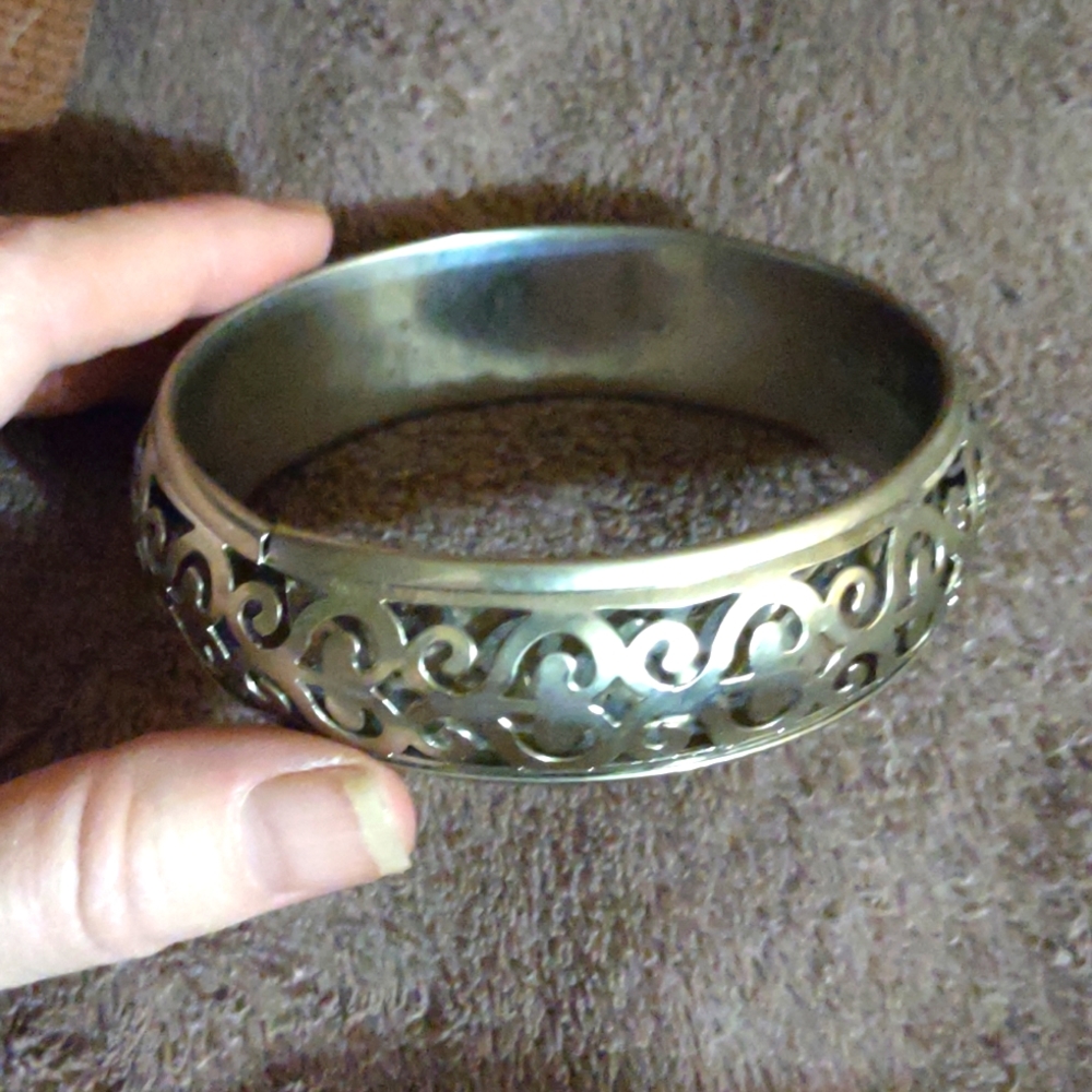 Silver filigree large bangle bracelet.